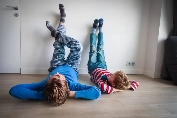 Dad and son relax at home, comfort and family time — Stock Photo, Image