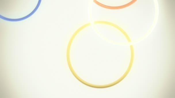 Spada, odbijając się kolorowe pierścienie w zwolnionym tempie pętli — Wideo stockowe