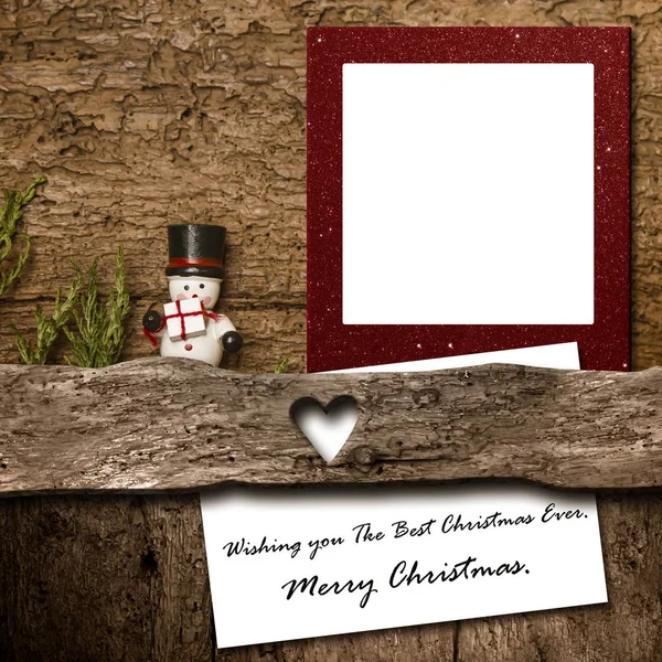 Natal moldura da foto em branco e mensagem de saudação — Fotografia de Stock