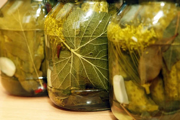 Glass jar with pickled cucumbers — Stock Photo, Image