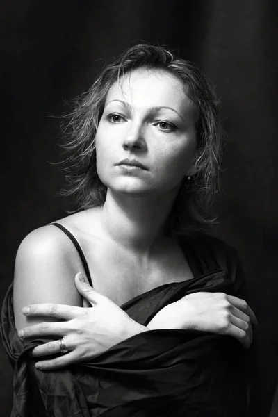 Portrait of the beautiful woman in studio — Stock Photo, Image