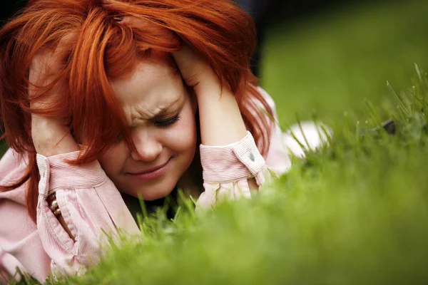 Girl in a grass — Stock Photo, Image