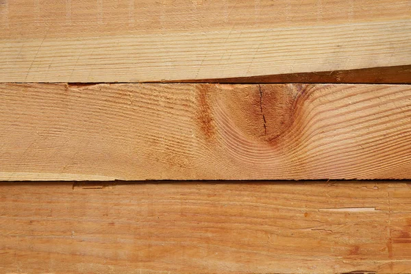 Close-up pattern of stacked rectangular wooden beam timber at sawmill lumberyard — Stock Photo, Image