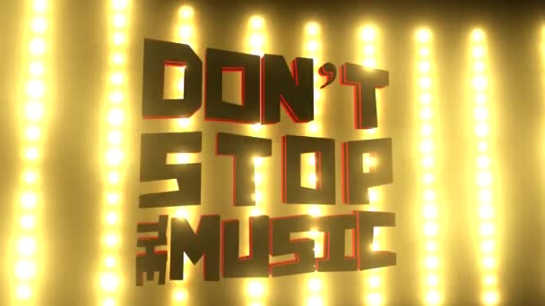 Don't stop the music sign on a bright concert lights wall — Stock Video