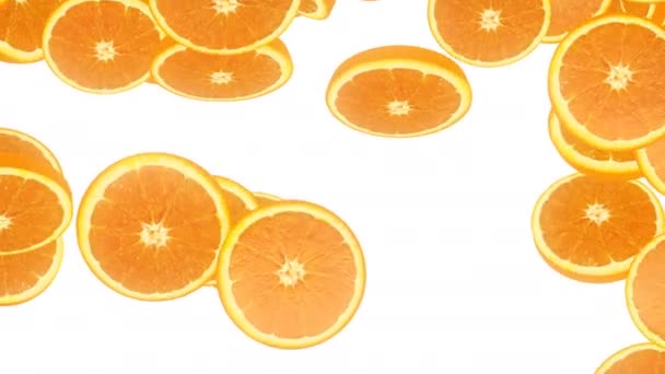 Fallande apelsinskivor — Stockvideo