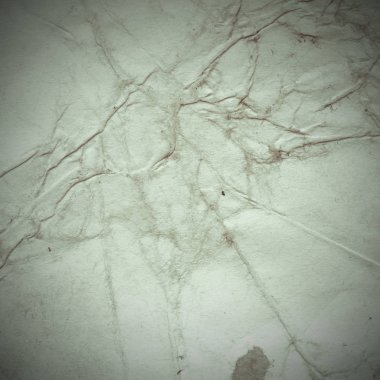 Eski toprak ve kirli lekelerle dolu bir arka plan. Boş eski kağıt çarşaf. Eski ve antika sanat konsepti. Karton, taş, beton ya da doğal mermer gibi desen