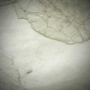 Eski toprak ve kirli lekelerle dolu bir arka plan. Boş eski kağıt çarşaf. Eski ve antika sanat konsepti. Karton, taş, beton ya da doğal mermer gibi desen.