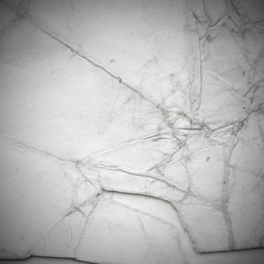 Eski toprak ve kirli lekelerle dolu bir arka plan. Boş eski kağıt çarşaf. Eski ve antika sanat konsepti. Karton, taş, beton ya da doğal mermer gibi desen.