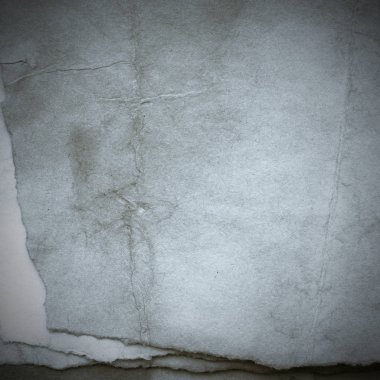 Eski toprak ve kirli lekelerle dolu bir arka plan. Boş eski kağıt çarşaf. Eski ve antika sanat konsepti. Karton, taş, beton ya da doğal mermer gibi desen 