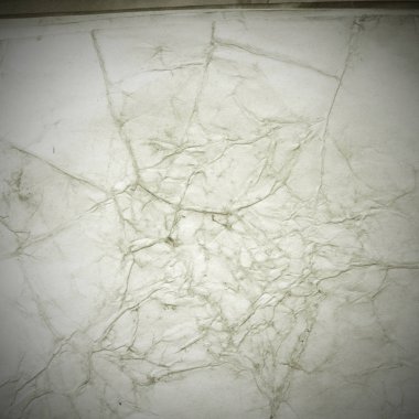 Eski toprak ve kirli lekelerle dolu bir arka plan. Boş eski kağıt çarşaf. Eski ve antika sanat konsepti. Karton, taş, beton ya da doğal mermer gibi desen.