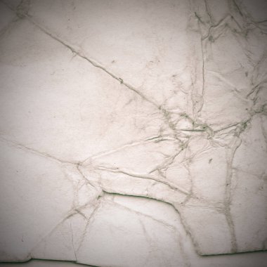 Eski toprak ve kirli lekelerle dolu bir arka plan. Boş eski kağıt çarşaf. Eski ve antika sanat konsepti. Karton, taş, beton ya da doğal mermer gibi desen 