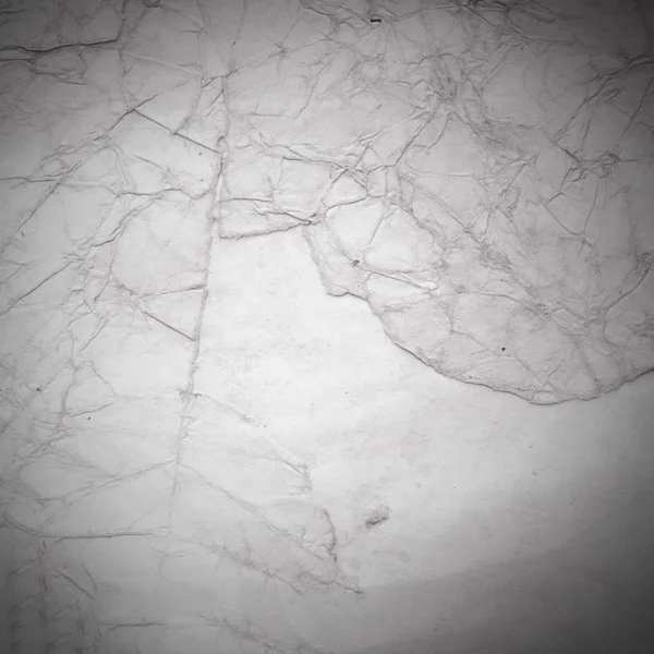 Eski toprak ve kirli lekelerle dolu bir arka plan. Boş eski kağıt çarşaf. Eski ve antika sanat konsepti. Karton, taş, beton ya da doğal mermer gibi desen.