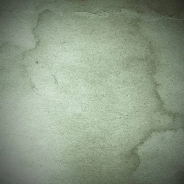 Eski toprak ve kirli lekelerle dolu bir arka plan. Boş eski kağıt çarşaf. Eski ve antika sanat konsepti. Karton, taş, beton ya da doğal mermer gibi desen.