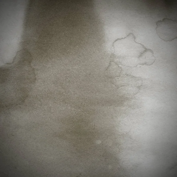 Eski toprak ve kirli lekelerle dolu bir arka plan. Boş eski kağıt çarşaf. Eski ve antika sanat konsepti. Karton, taş, beton ya da doğal mermer gibi desen. 