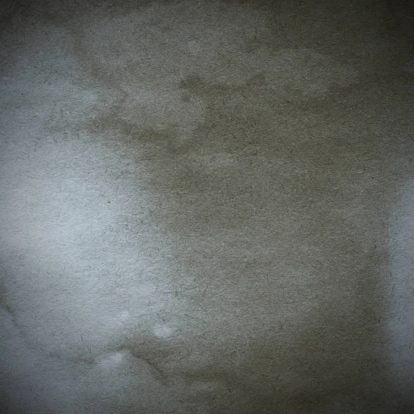 Eski toprak ve kirli lekelerle dolu bir arka plan. Boş eski kağıt çarşaf. Eski ve antika sanat konsepti. Karton, taş, beton ya da doğal mermer gibi desen