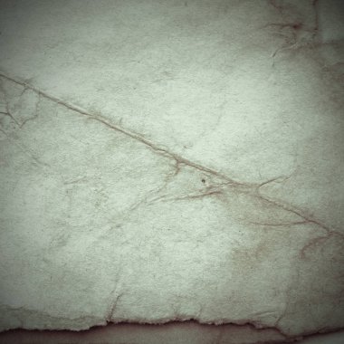 Eski toprak ve kirli lekelerle dolu bir arka plan. Boş eski kağıt çarşaf. Eski ve antika sanat konsepti. Karton, taş, beton ya da doğal mermer gibi desen