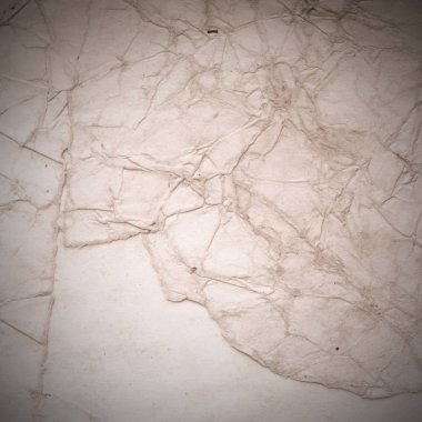 Eski toprak ve kirli lekelerle dolu bir arka plan. Boş eski kağıt çarşaf. Eski ve antika sanat konsepti. Karton, taş, beton ya da doğal mermer gibi desen