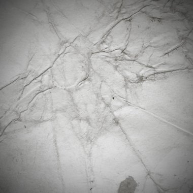 Eski toprak ve kirli lekelerle dolu bir arka plan. Boş eski kağıt çarşaf. Eski ve antika sanat konsepti. Karton, taş, beton ya da doğal mermer gibi desen. 