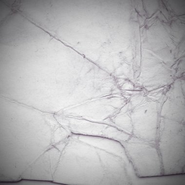 Eski toprak ve kirli lekelerle dolu bir arka plan. Boş eski kağıt çarşaf. Eski ve antika sanat konsepti. Karton, taş, beton ya da doğal mermer gibi desen. 