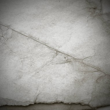 Eski toprak ve kirli lekelerle dolu bir arka plan. Boş eski kağıt çarşaf. Eski ve antika sanat konsepti. Karton, taş, beton ya da doğal mermer gibi desen.