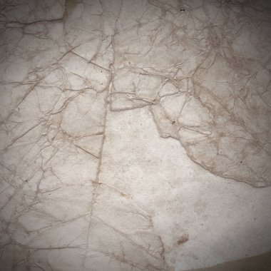 Eski toprak ve kirli lekelerle dolu bir arka plan. Boş eski kağıt çarşaf. Eski ve antika sanat konsepti. Karton, taş, beton ya da doğal mermer gibi desen.