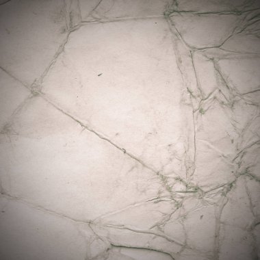 Eski toprak ve kirli lekelerle dolu bir arka plan. Boş eski kağıt çarşaf. Eski ve antika sanat konsepti. Karton, taş, beton ya da doğal mermer gibi desen 