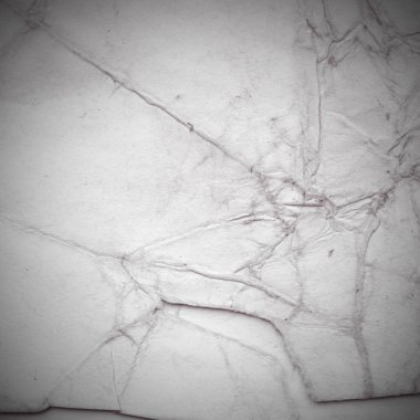 Eski toprak ve kirli lekelerle dolu bir arka plan. Boş eski kağıt çarşaf. Eski ve antika sanat konsepti. Karton, taş, beton ya da doğal mermer gibi desen.