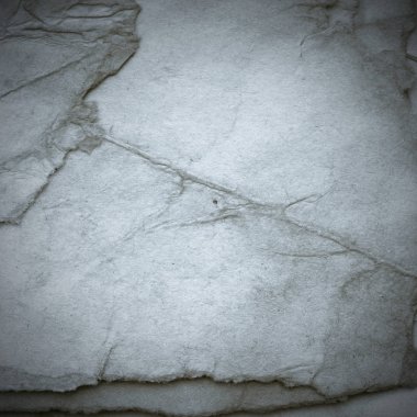 Eski toprak ve kirli lekelerle dolu bir arka plan. Boş eski kağıt çarşaf. Eski ve antika sanat konsepti. Karton, taş, beton ya da doğal mermer gibi desen 