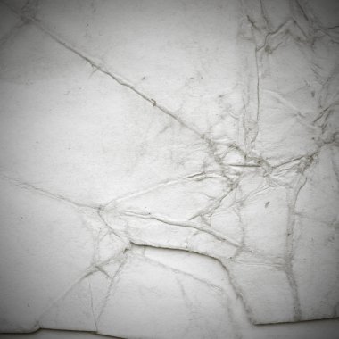 Eski toprak ve kirli lekelerle dolu bir arka plan. Boş eski kağıt çarşaf. Eski ve antika sanat konsepti. Karton, taş, beton ya da doğal mermer gibi desen. 