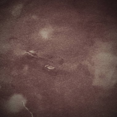 Eski toprak ve kirli lekelerle dolu bir arka plan. Boş eski kağıt çarşaf. Eski ve antika sanat konsepti. Karton, taş, beton ya da doğal mermer gibi desen.