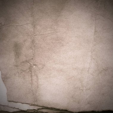 Eski toprak ve kirli lekelerle dolu bir arka plan. Boş eski kağıt çarşaf. Eski ve antika sanat konsepti. Karton, taş, beton ya da doğal mermer gibi desen.