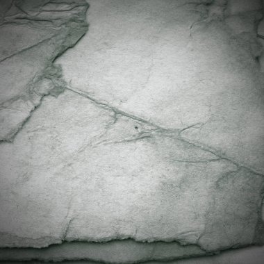 Eski toprak ve kirli lekelerle dolu bir arka plan. Boş eski kağıt çarşaf. Eski ve antika sanat konsepti. Karton, taş, beton ya da doğal mermer gibi desen. 