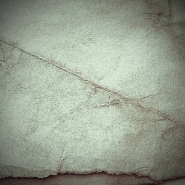 Eski toprak ve kirli lekelerle dolu bir arka plan. Boş eski kağıt çarşaf. Eski ve antika sanat konsepti. Karton, taş, beton ya da doğal mermer gibi desen