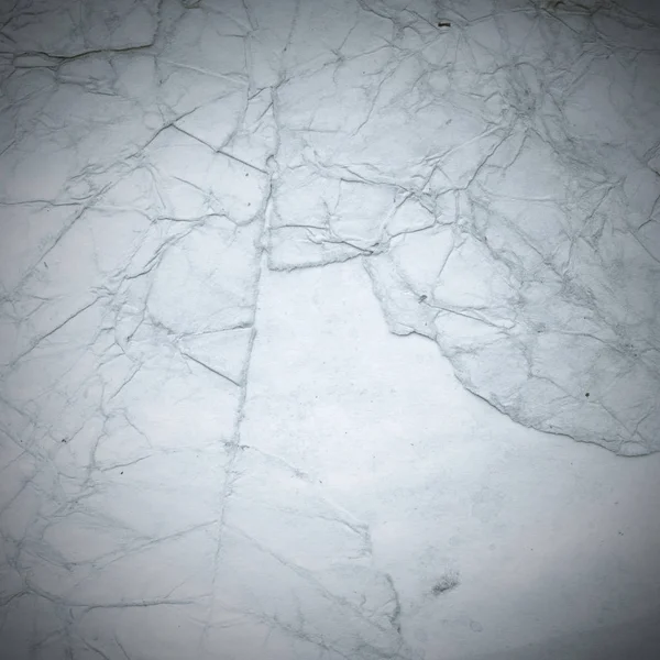 Eski toprak ve kirli lekelerle dolu bir arka plan. Boş eski kağıt çarşaf. Eski ve antika sanat konsepti. Karton, taş, beton ya da doğal mermer gibi desen 