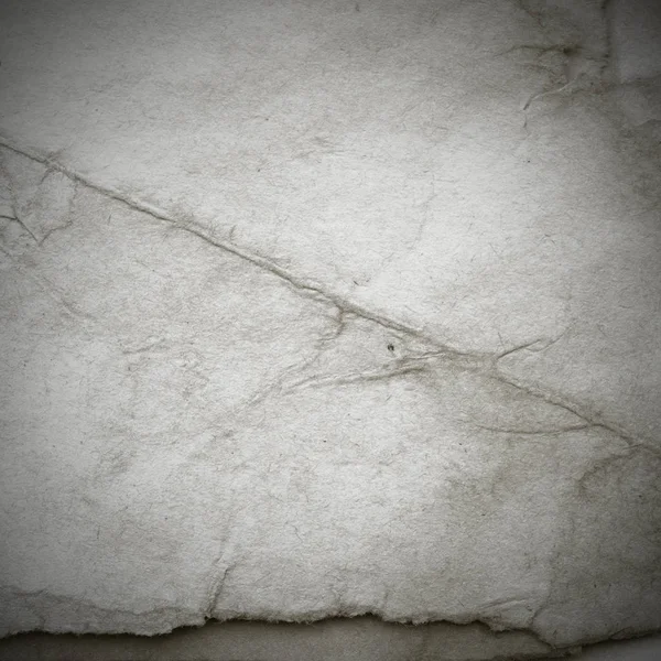 Eski toprak ve kirli lekelerle dolu bir arka plan. Boş eski kağıt çarşaf. Eski ve antika sanat konsepti. Karton, taş, beton ya da doğal mermer gibi desen.