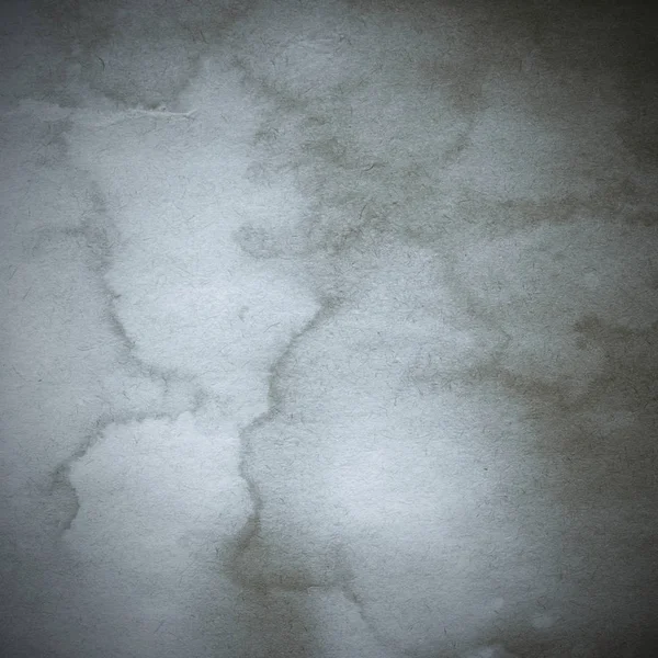 Eski toprak ve kirli lekelerle dolu bir arka plan. Boş eski kağıt çarşaf. Eski ve antika sanat konsepti. Karton, taş, beton ya da doğal mermer gibi desen