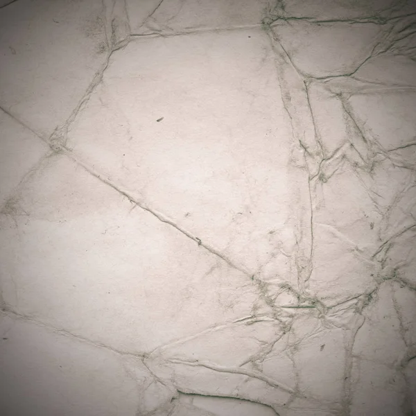 Eski toprak ve kirli lekelerle dolu bir arka plan. Boş eski kağıt çarşaf. Eski ve antika sanat konsepti. Karton, taş, beton ya da doğal mermer gibi desen 