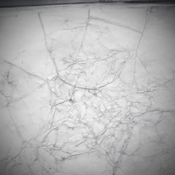 Eski toprak ve kirli lekelerle dolu bir arka plan. Boş eski kağıt çarşaf. Eski ve antika sanat konsepti. Karton, taş, beton ya da doğal mermer gibi desen. 