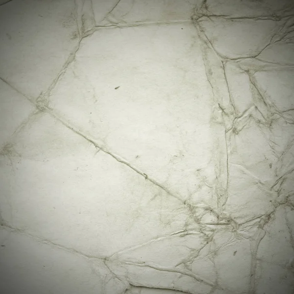 Eski toprak ve kirli lekelerle dolu bir arka plan. Boş eski kağıt çarşaf. Eski ve antika sanat konsepti. Karton, taş, beton ya da doğal mermer gibi desen.