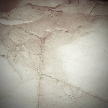 Eski toprak ve kirli lekelerle dolu bir arka plan. Boş eski kağıt çarşaf. Eski ve antika sanat konsepti. Karton, taş, beton ya da doğal mermer gibi desen.