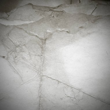 Eski toprak ve kirli lekelerle dolu bir arka plan. Boş eski kağıt çarşaf. Eski ve antika sanat konsepti. Karton, taş, beton ya da doğal mermer gibi desen.