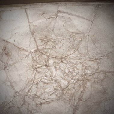 Eski toprak ve kirli lekelerle dolu bir arka plan. Boş eski kağıt çarşaf. Eski ve antika sanat konsepti. Karton, taş, beton ya da doğal mermer gibi desen.