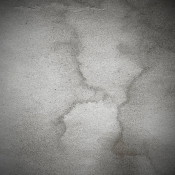 Eski toprak ve kirli lekelerle dolu bir arka plan. Boş eski kağıt çarşaf. Eski ve antika sanat konsepti. Karton, taş, beton ya da doğal mermer gibi desen. 