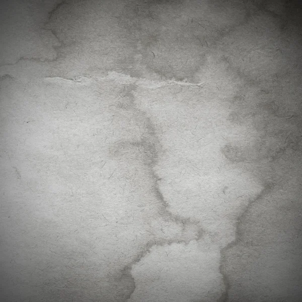 Eski toprak ve kirli lekelerle dolu bir arka plan. Boş eski kağıt çarşaf. Eski ve antika sanat konsepti. Karton, taş, beton ya da doğal mermer gibi desen. 