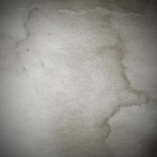 Eski toprak ve kirli lekelerle dolu bir arka plan. Boş eski kağıt çarşaf. Eski ve antika sanat konsepti. Karton, taş, beton ya da doğal mermer gibi desen. 