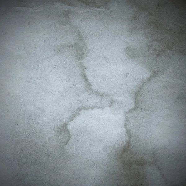 Eski toprak ve kirli lekelerle dolu bir arka plan. Boş eski kağıt çarşaf. Eski ve antika sanat konsepti. Karton, taş, beton ya da doğal mermer gibi desen