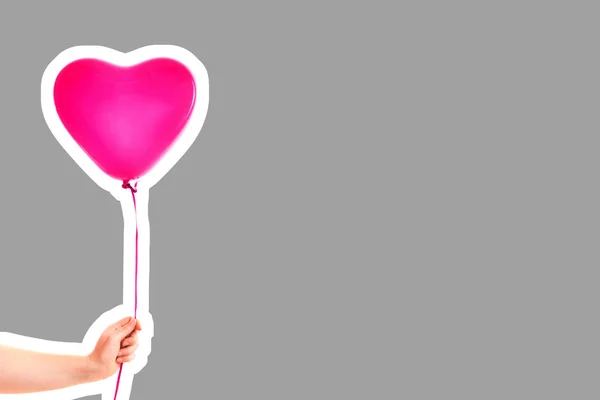 Female Hand Holds Pink Rubber Inflatable Heart Shape Balloon Love — 스톡 사진