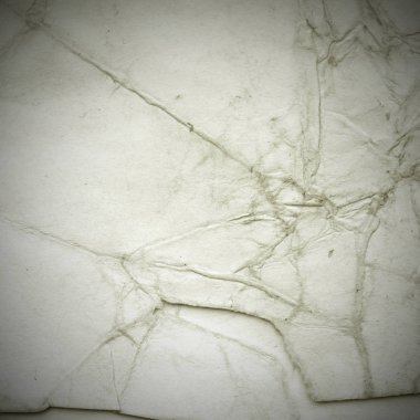 Eski toprak ve kirli lekelerle dolu bir arka plan. Boş eski kağıt çarşaf. Eski ve antika sanat konsepti. Karton, taş, beton ya da doğal mermer gibi desen.