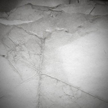 Eski toprak ve kirli lekelerle dolu bir arka plan. Boş eski kağıt çarşaf. Eski ve antika sanat konsepti. Karton, taş, beton ya da doğal mermer gibi desen.