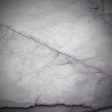 Eski toprak ve kirli lekelerle dolu bir arka plan. Boş eski kağıt çarşaf. Eski ve antika sanat konsepti. Karton, taş, beton ya da doğal mermer gibi desen. 